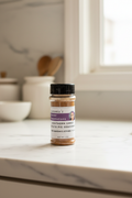 Southern Sweet Potato Pie Seasoning on a kitchen counter in natural lighting
